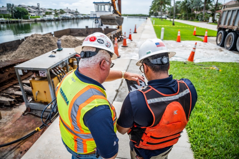 construction field workers on tablet