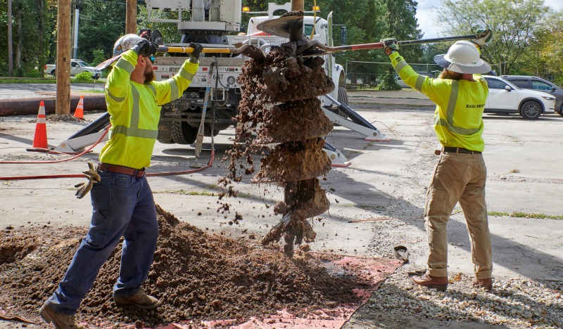 Earth auger pole installation